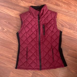 Maroon puffer vest.
